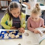 Children researching fossils.